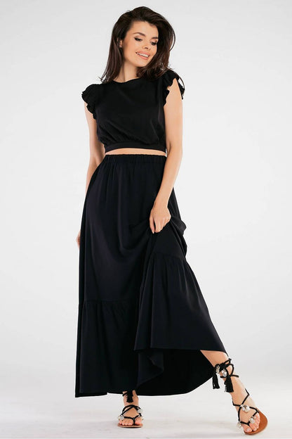Elegant Maxi Skirt with Frill Detail, presenting a model in a chic black maxi skirt with frill detail, perfect for summer evenings, crafted from a comfortable viscose blend.