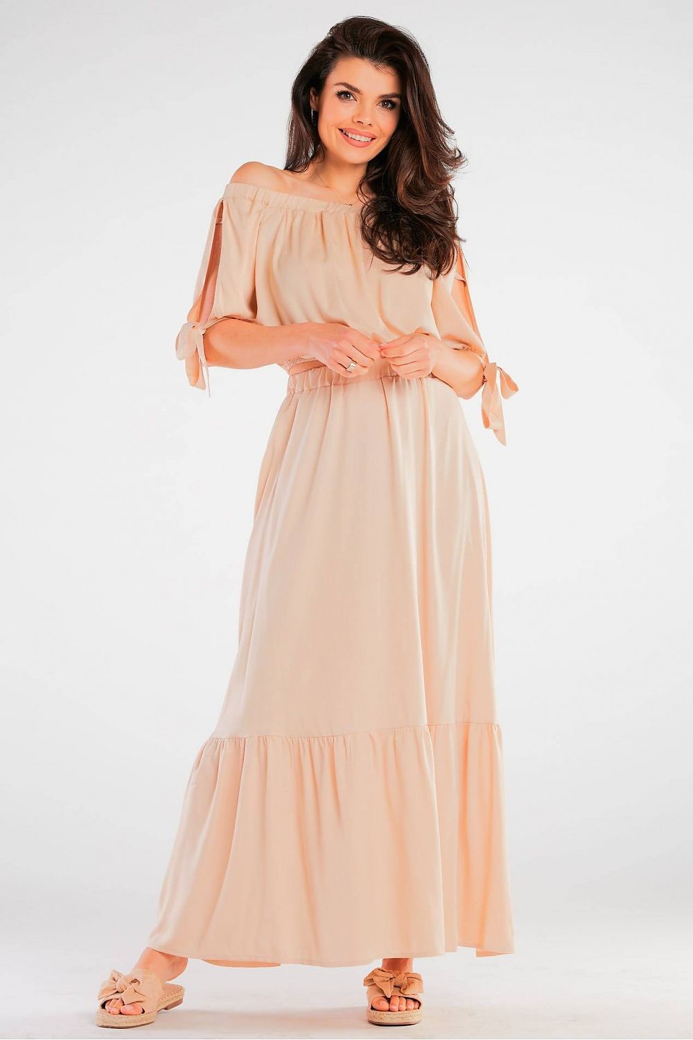 Elegant Spanish Style Blouse with Tied Sleeves - Light Viscose for Summer Comfort, showcasing a model wearing a peach-coloured blouse with tied sleeves, featuring a flowing design and relaxed fit, perfect for warm weather.