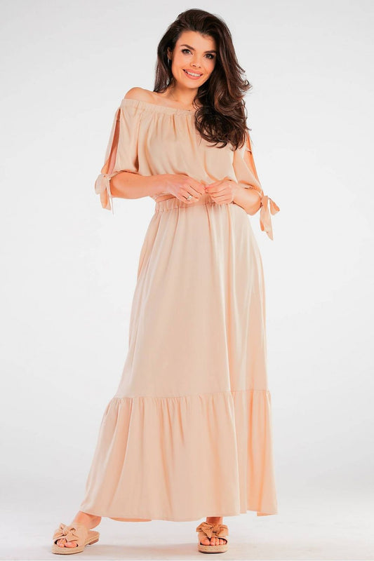 Elegant Spanish Style Blouse with Tied Sleeves - Light Viscose for Summer Comfort, showcasing a model wearing a peach-coloured blouse with tied sleeves, featuring a flowing design and relaxed fit, perfect for warm weather.