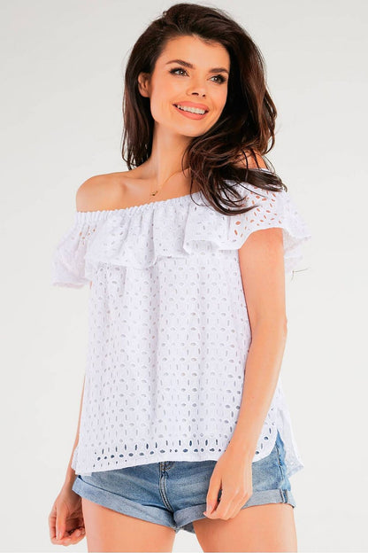 Stunning Airy Spanish-Style Blouse by Awama featuring a frill neckline, perfect for summer wear, paired with denim shorts.
