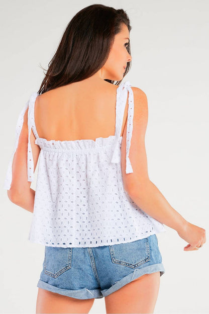 Back view of the Stylish Loose Cotton Blouse With Tied Straps by Awama, highlighting the intricate openwork detail at the neckline and tied straps.