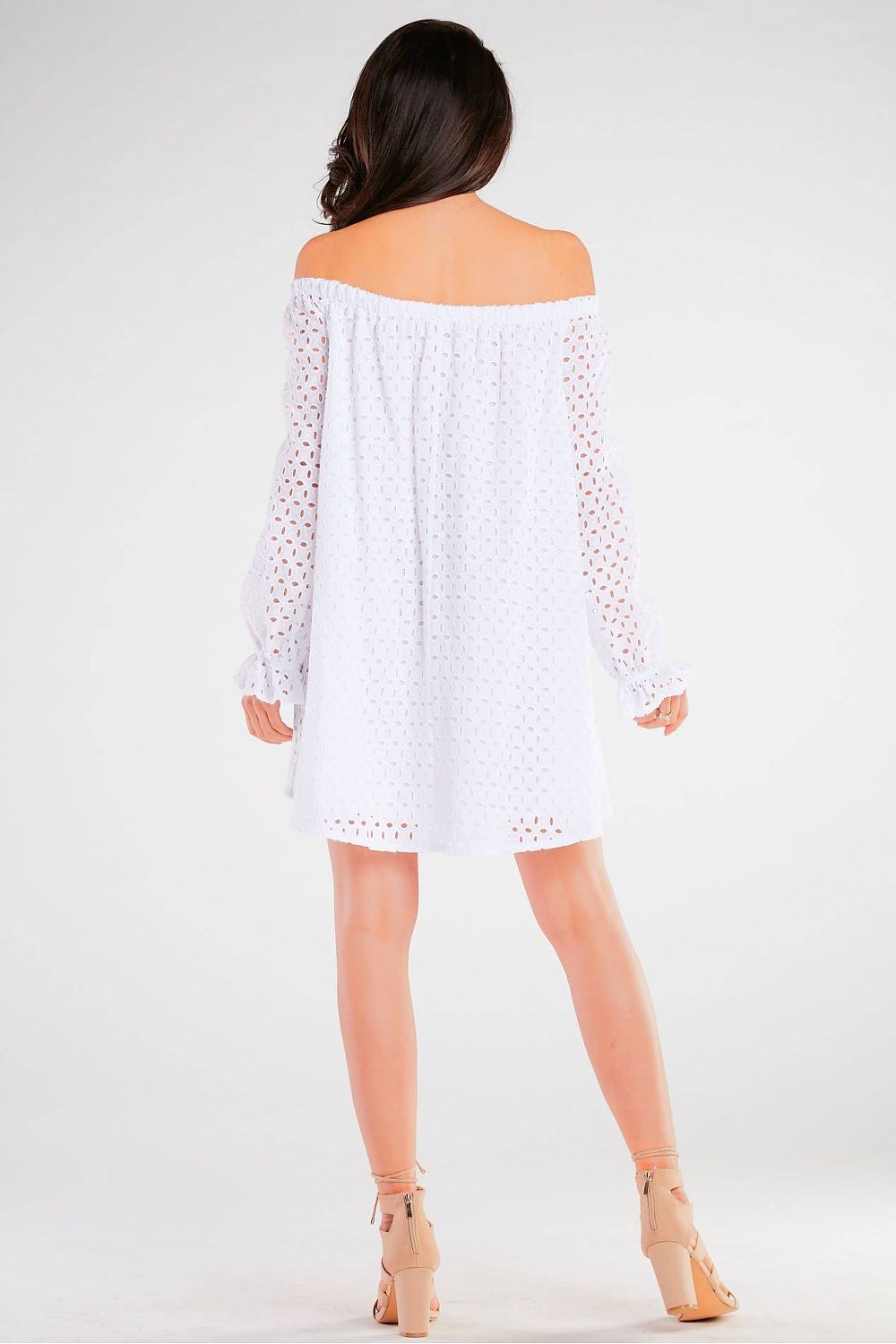 Back view of the Flared Cotton Daydress by Awama in white, highlighting its elegant loose-fitting Spanish design.
