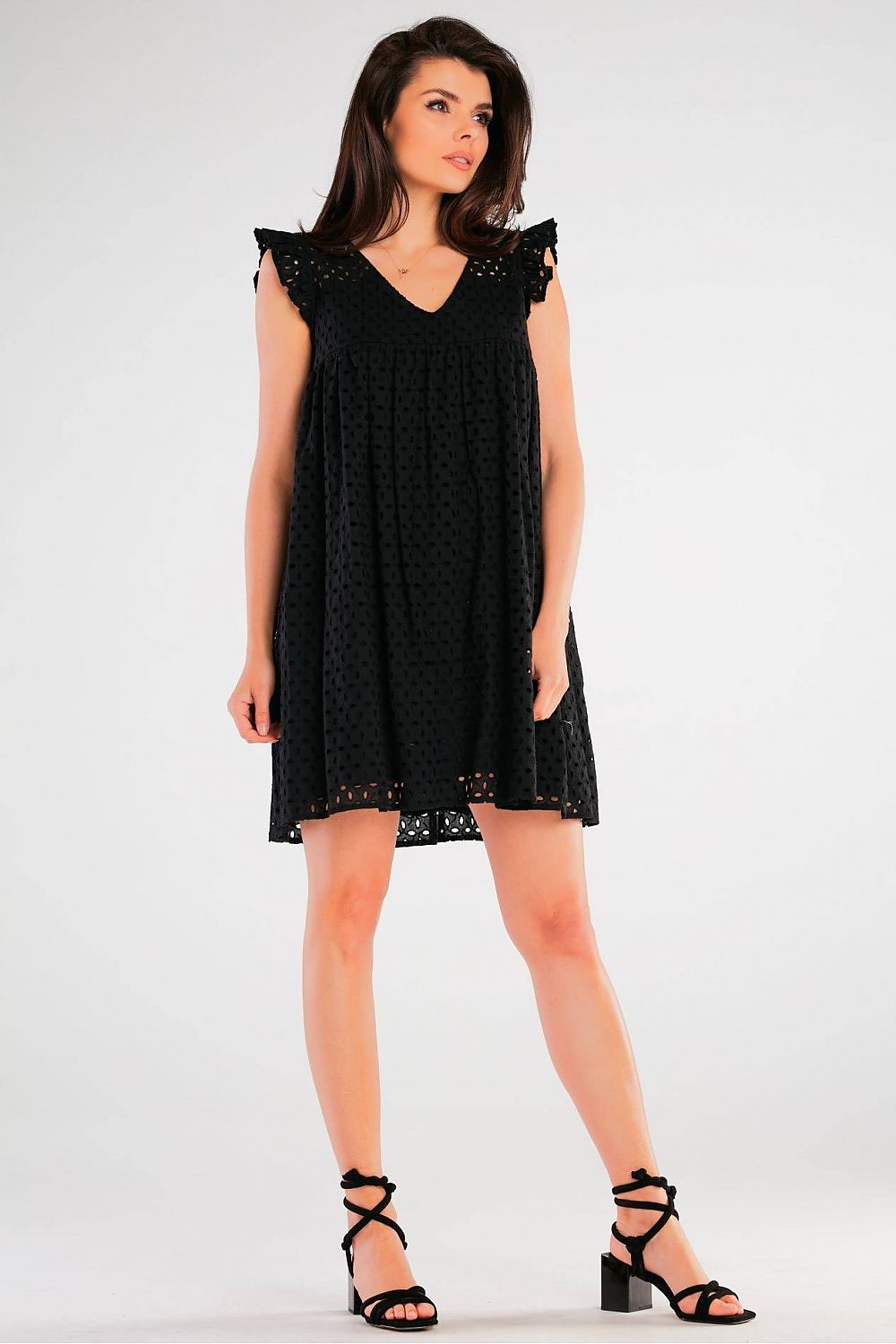 Elegant Cotton Daydress with Frilled Shoulders displayed on a model, showcasing a beautiful black openwork design, ideal for family gatherings and nights out.