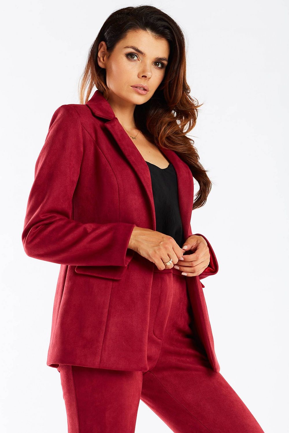 Elegant Women's Awama Jacket with Shawl Collar and Golden Button, styled in a bold red colour, enhancing the model's elegance with its tailored fit.