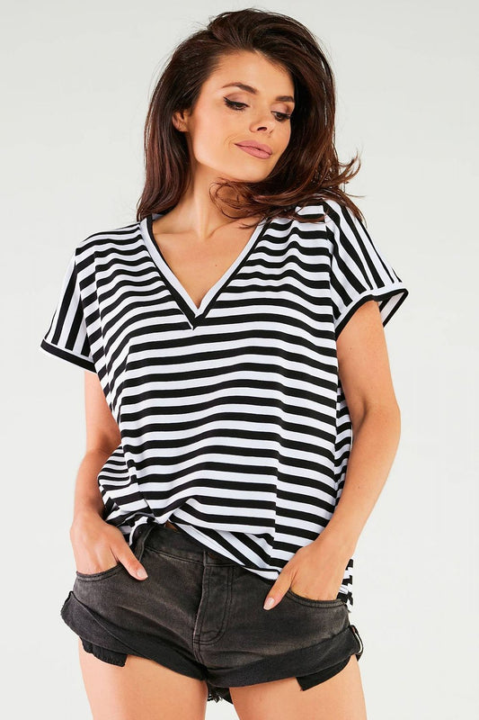 Sensational Cotton Blouse with V-Neckline for Elegant Style - Made in Poland by Infinite You, featuring a stylish black and white striped design, showcased gracefully on a model.