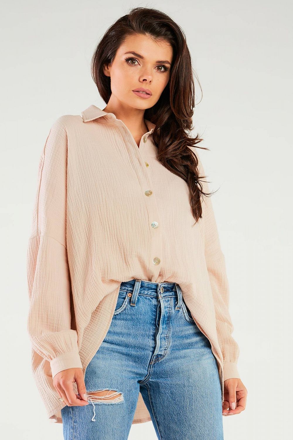 Elegant Oversized Long Sleeve Shirt with Adjustable Neckline by Infinite You, featuring a stylish model wearing a soft pastel shirt paired with high-waisted jeans, perfect for a chic and sophisticated look.