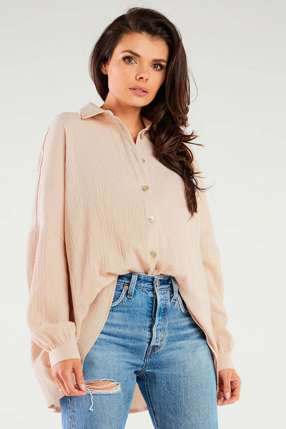 Elegant Oversized Long Sleeve Shirt with Adjustable Neckline by Infinite You, featuring a stylish model wearing a soft pastel shirt paired with high-waisted jeans, perfect for a chic and sophisticated look.