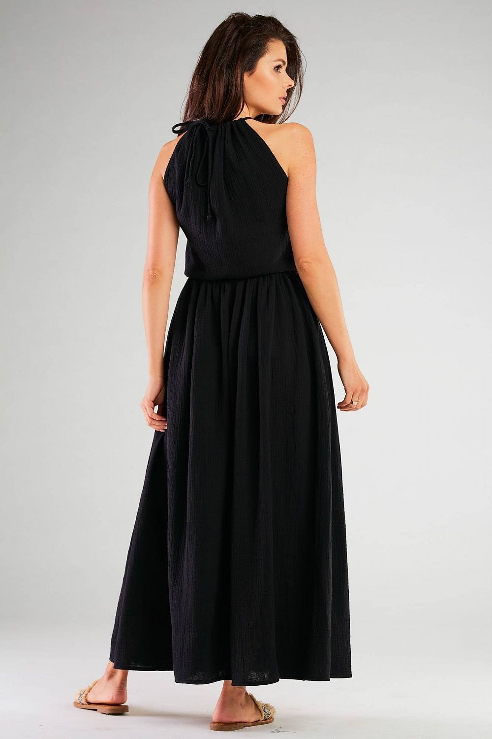 Chic back view of the Infinite You Daydress with Side Slits in black, featuring elegant halter neck design and luxurious pleated detailing for sophisticated styling.