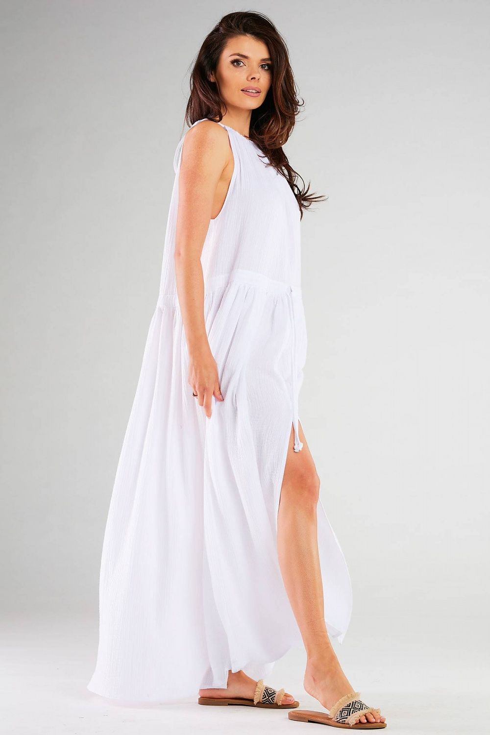 Sophisticated side view of the Infinite You Daydress with Side Slits in white, emphasising the luxe fabric and flattering silhouette, perfect for elegant gatherings.