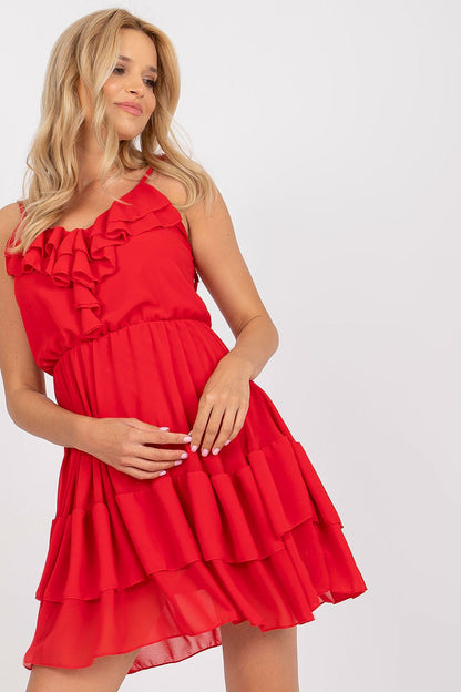 Elegant Summer Dress with Frilled Neckline and Straps by Och Bella - Flared Design, model in a vibrant red summer dress with frills, embodying luxury and charm.