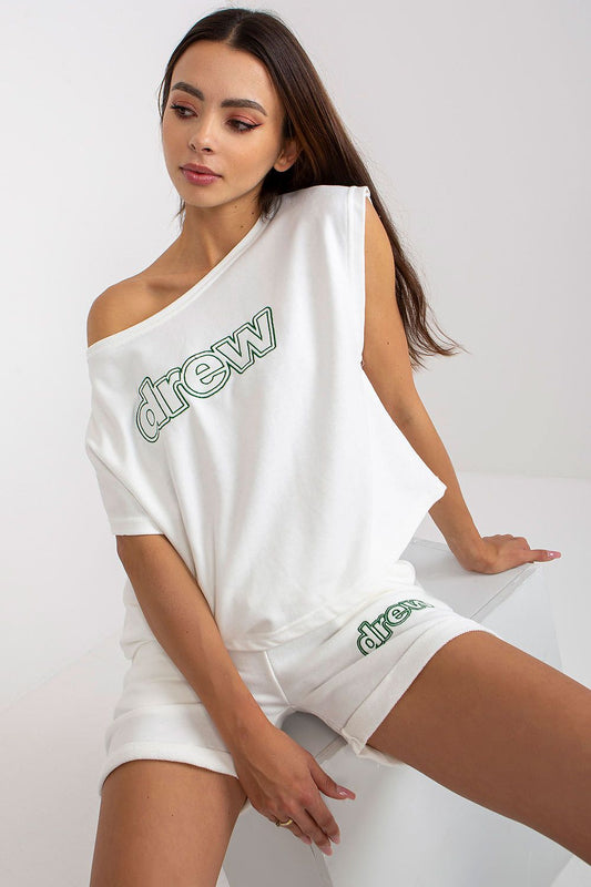 Luxury Ex Moda Women's Tracksuit Set featuring a relaxed cotton blouse and high-waisted shorts, elegantly styled with an off-shoulder design.