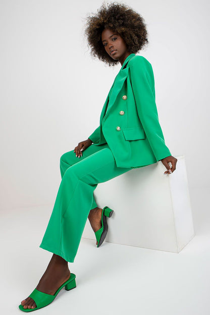 Stylish Ladies' Jacket by Italy Moda showcased in green, elegantly posed on a model, radiating sophistication and modern chic aesthetics.