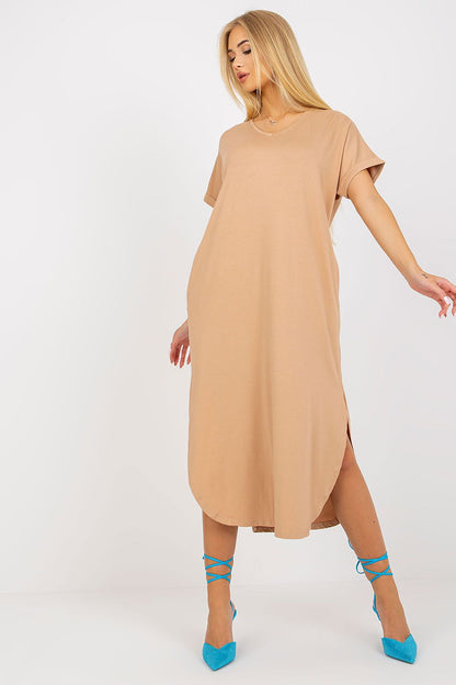 Chic luxury short-sleeved daydress by Och Bella in a warm beige tone, complete with stylish slits and convenient pockets, ideal for effortless elegance.