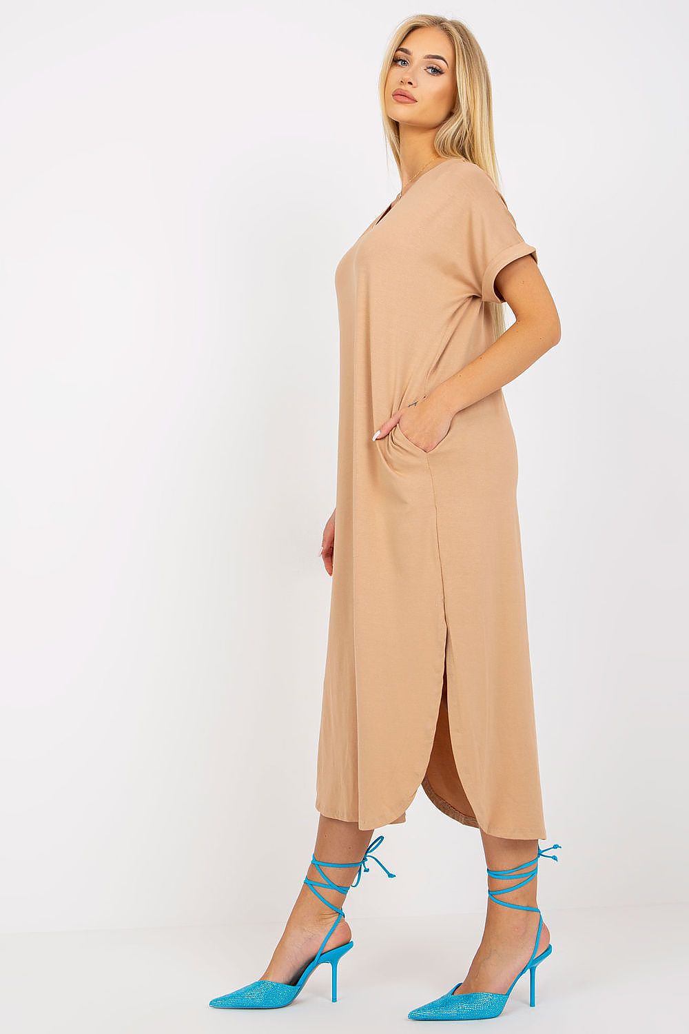 Refined luxury short-sleeved daydress by Och Bella in beige, incorporating stylish slits and side pockets for a blend of sophistication and comfort.