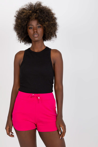 High-Waisted Cotton Spandex Sweatshorts with Drawstring and Slip-On Pockets - BFG model exudes elegance in a black tank top and bright pink sweatshorts, emphasizing a luxurious casual look.
