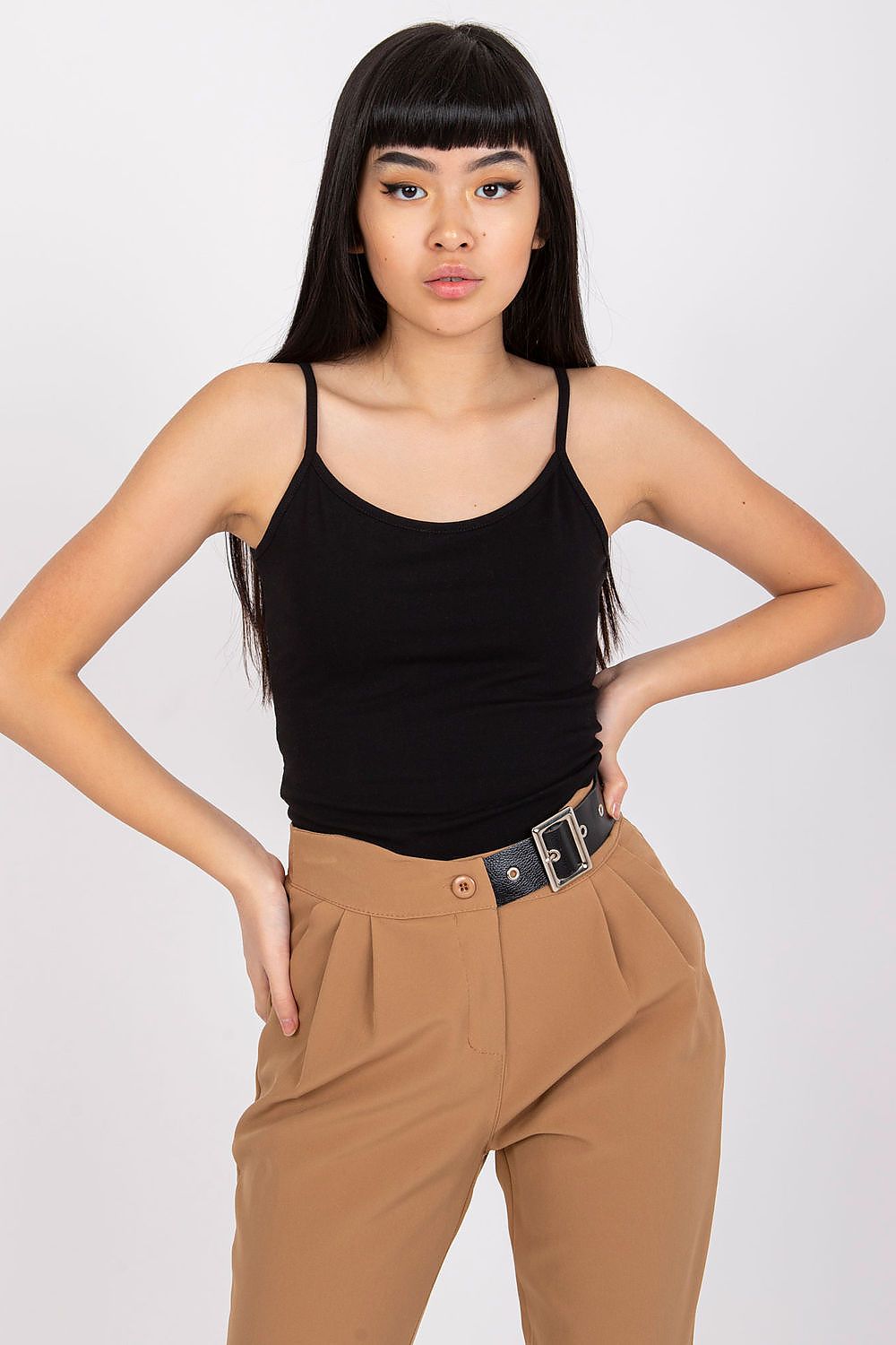Luxurious Cotton Spandex Strapless Shirt with Round Neckline being showcased by a model wearing black, creating a chic and elegant look, perfect for versatile styles.