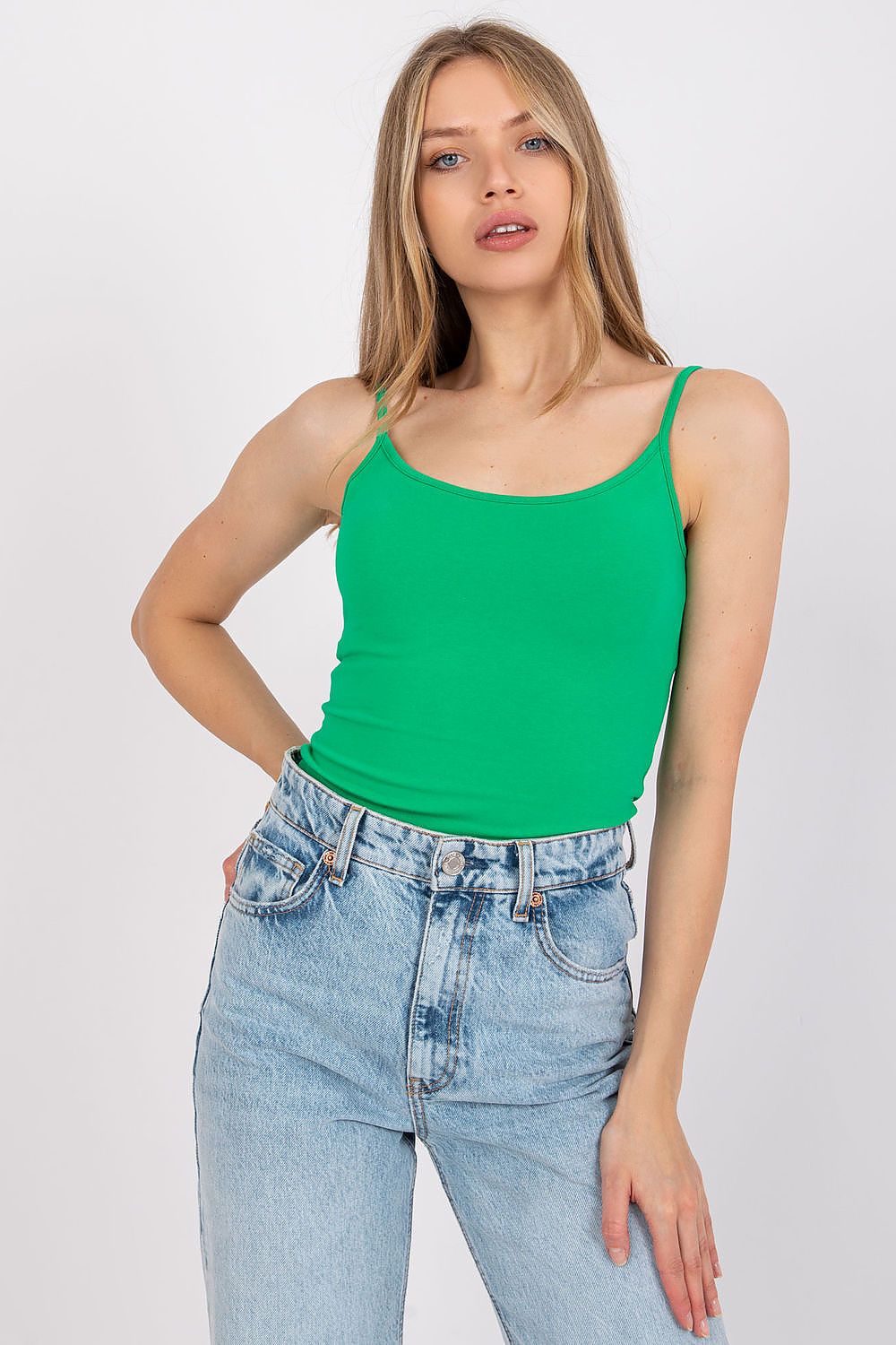 A model presenting the Luxurious Cotton Spandex Strapless Shirt with Round Neckline in vibrant green, illustrating its stylish appeal for dynamic fashion ensembles.