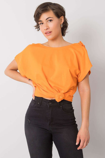 Elegant Short Sleeve Blouse With Frill Trimmed Deep Cut-Out, Cotton-Lycra Blend, EU Size 0, presented in a vibrant orange, complemented by stylish high-waisted black jeans.