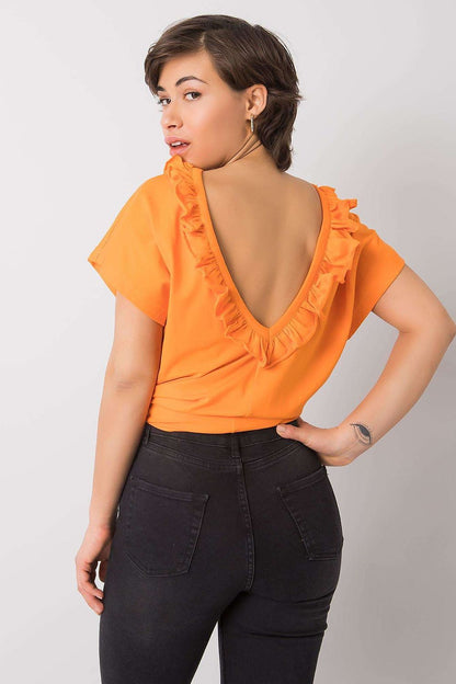 Elegant Short Sleeve Blouse With Frill Trimmed Deep Cut-Out, Cotton-Lycra Blend, EU Size 0, focusing on the back design featuring a ruffled deep cut-out, paired elegantly with high-waisted black trousers.