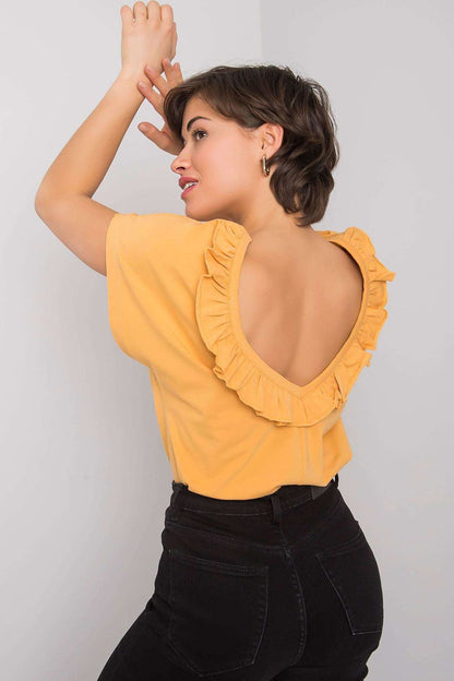 Elegant short sleeve blouse with frill trimmed deep cut-out in a rich yellow shade, showcasing a stylish back view, perfect for sophisticated summer outfits.