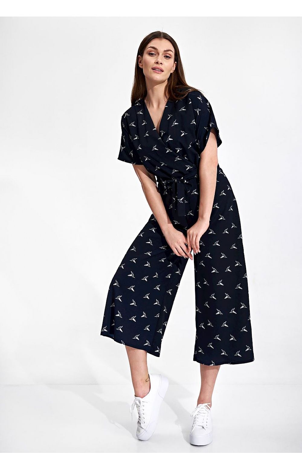 Luxury Figl 7/8 Length Kimono Sleeve Overalls with Elastic Waist and Decorative Ties showcased by a model in a stylish pose, emphasizing a sophisticated navy design.