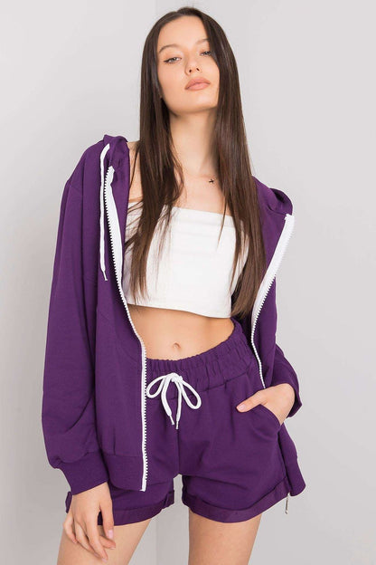 Luxury Tracksuit Set featuring a stylish hoodie sweatshirt with zipper and shorts with elastic waist, model showcasing a chic purple outfit for a comfortable yet fashionable look.