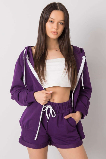 Luxury Tracksuit Set in purple, model displaying the hoodie sweatshirt with zipper and shorts with elastic waist, perfect for a fashionable casual style.