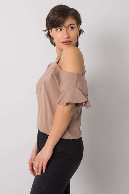 Stylish Off-Shoulder Cotton Blend Blouse with Short Sleeves in versatile beige, elegantly posed to highlight its chic design paired with form-fitting trousers.