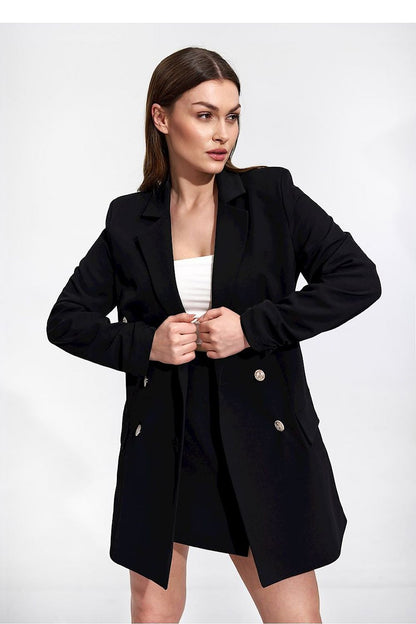 Luxury Figl Unlined Mini Skirt with Side Zip and Front Slit, model dressed in a black blazer and mini skirt combination, demonstrating versatility and luxury style.