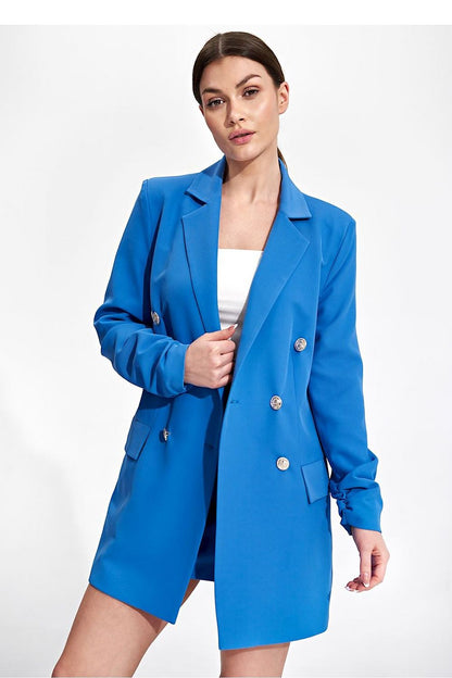 Elegant Long Polyester Jacket With Loose Fit And Double-Breasted Buttons By Figl, worn by a model in a stunning blue tone, portraying a confident front view.