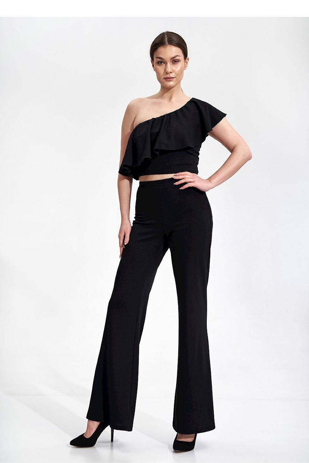 Elegant One Shoulder Ruffle Crop Top Blouse by Figl in black, displayed with tailored high-waisted pants, merging elegance with contemporary fashion.