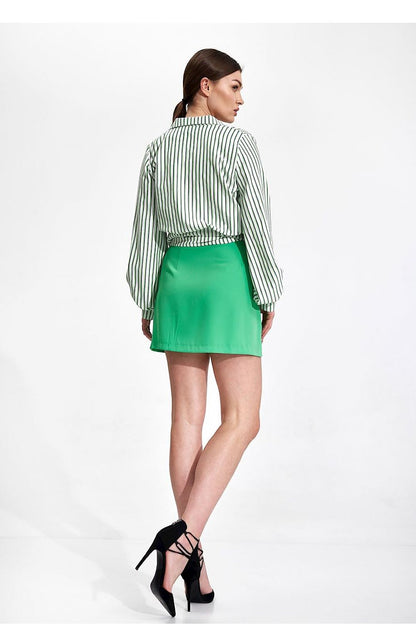 Elegant Envelope Blouse With Pleated Sleeves And Sash - Figl Fashion seen from behind on a model, exhibiting a graceful look with a green skirt and intricately designed blouse.