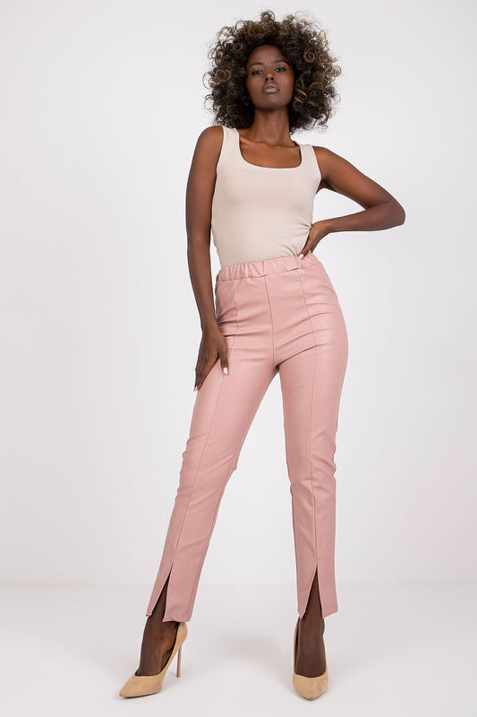 Luxury Women's High Rise Eco-Leather Trousers with Slits by Italy Moda, featuring a model showcasing stylish pink trousers with a high waist and elegant slits, paired with a fitted top and heels, embodying sophisticated fashion.