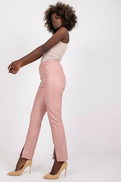 Luxury Women's High Rise Eco-Leather Trousers with Slits by Italy Moda, showcased on a model in a side profile, emphasising the stylish slits and elegant high-rise fit, perfect for sophisticated fashion statements.