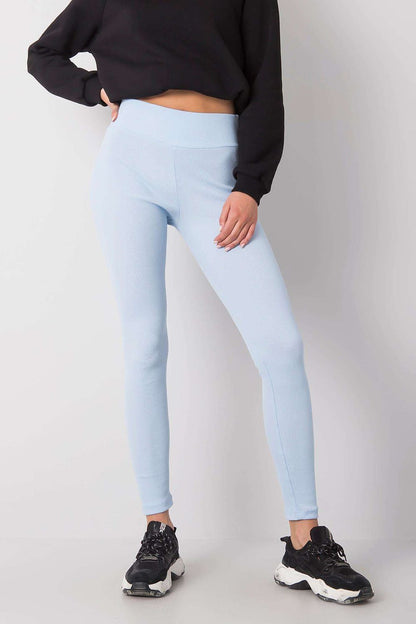 Elegant High-Waisted Ribbed Leggings for Women by BFG in a stunning light blue hue, styled with a cropped black sweatshirt, exemplifying a modern, luxury athleisure aesthetic.