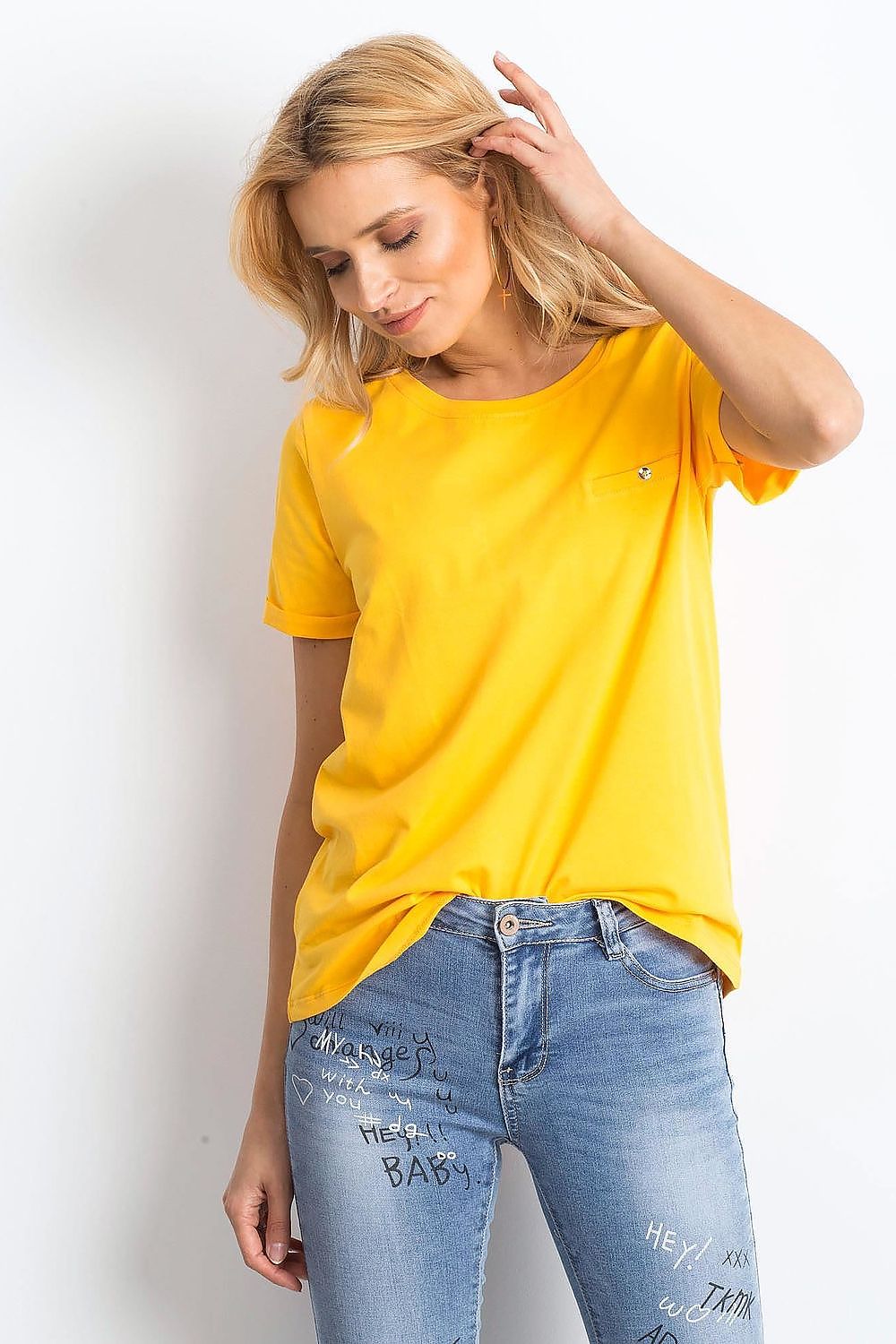 Luxurious Ladies Cotton Spandex Short-Sleeved T-Shirt with Round Neckline, highlighting a model dressed in a cheerful yellow t-shirt, perfect for casual outings or relaxed settings.