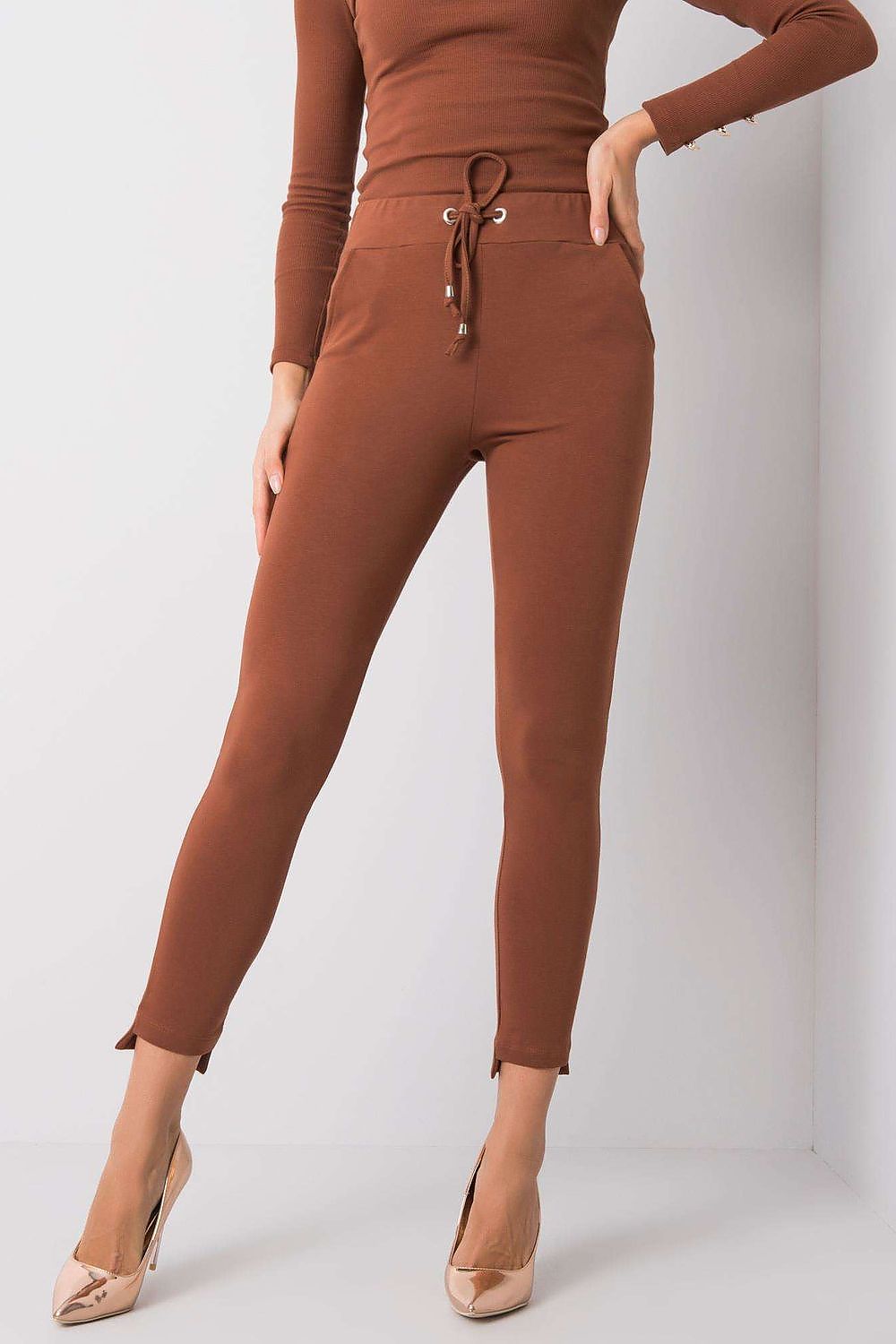 BFG Luxury Tapered Sweatpants with Adjustable Waist and Side Pockets - Stylish Cotton Blend, featuring a model showcasing the rich brown fabric and tapered fit.