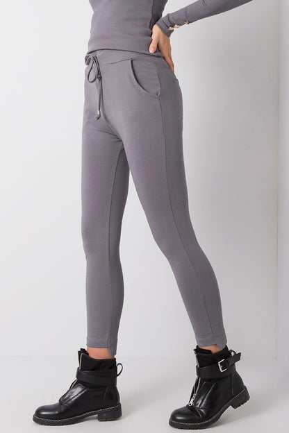 Close-up of BFG Luxury Tapered Sweatpants with Adjustable Waist and Side Pockets in grey, featuring stylish design and comfortable slip-on side pockets.