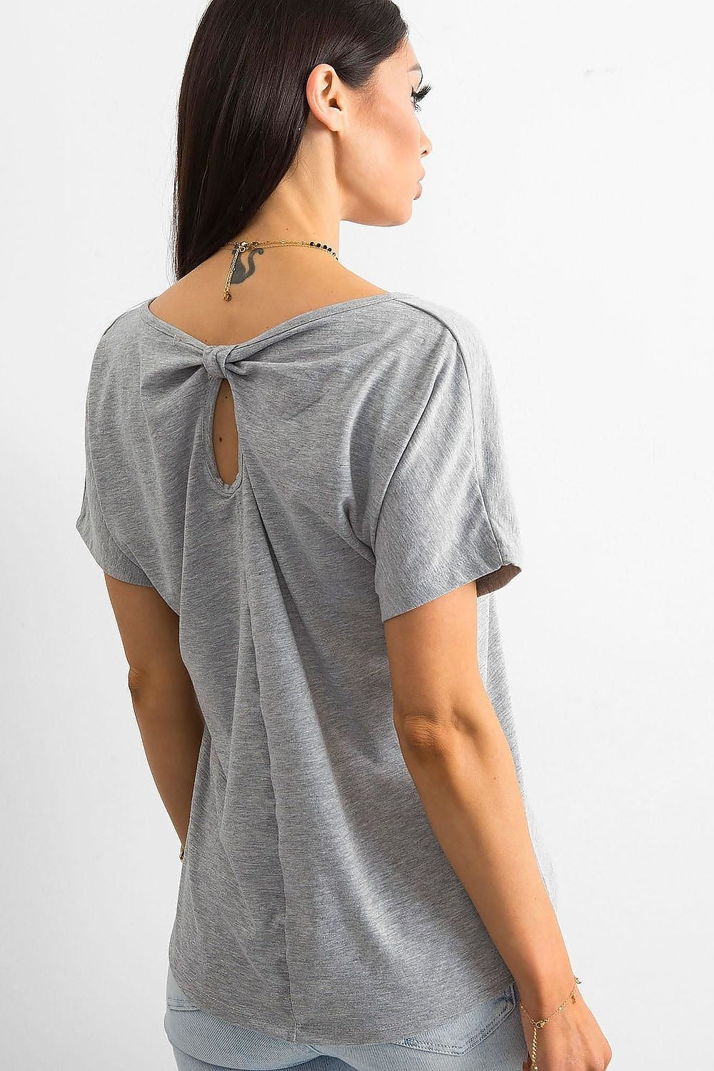 Back view of the Elegant Ladies' T-Shirt by BFG, featuring a stylish back slit detail, emphasizing luxury and elegance in casual wear.