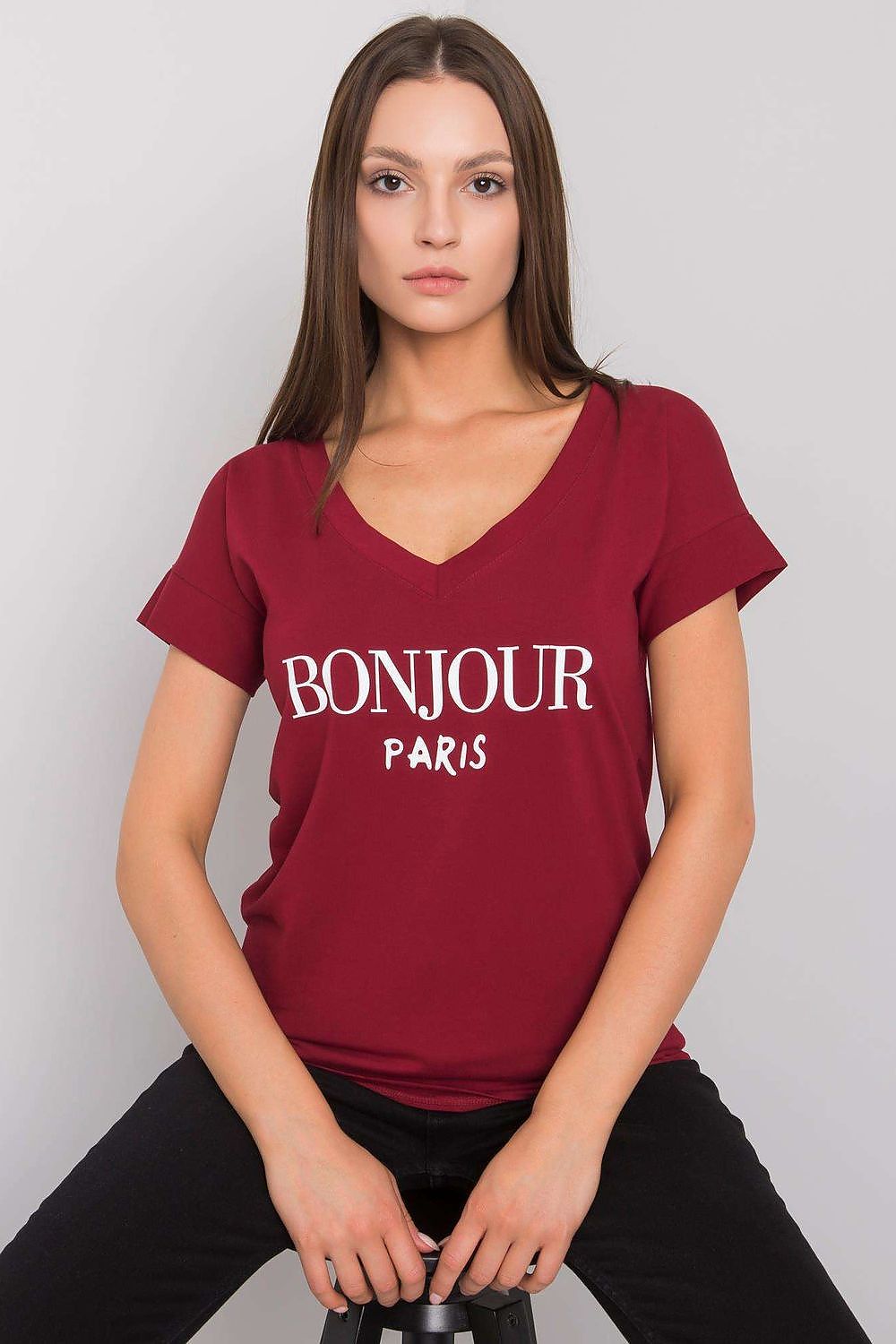Elegant Women's V-Neck T-Shirt in Soft Cotton-Lycra Blend with Decorative Front Wording, styled on a model showcasing a maroon colour.