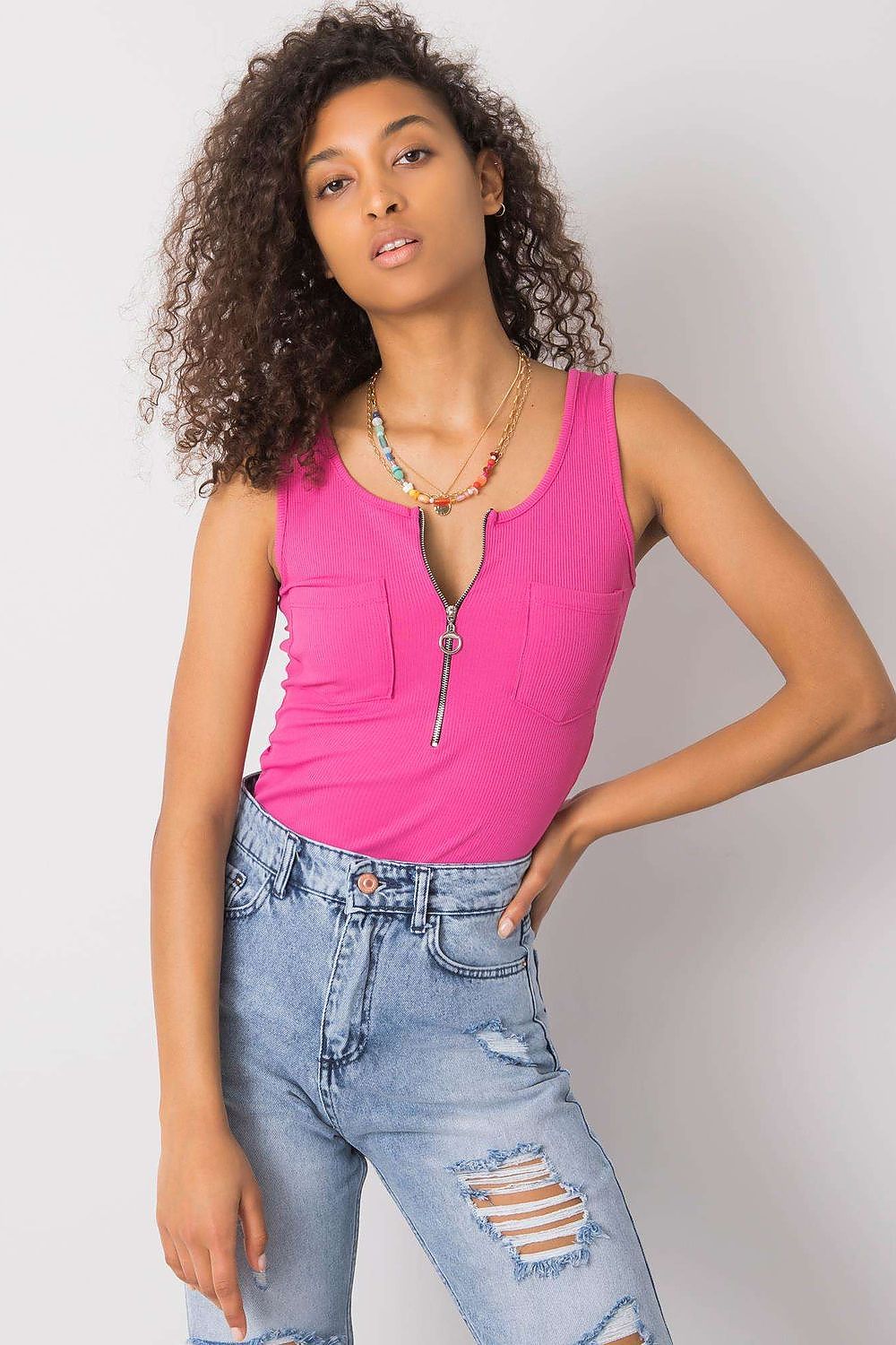 Luxury Italy Moda T-Shirt with Decorative Zipped Pockets and Round Neckline for Summer, highlighting a model in a bright pink tank top styled with high-rise distressed jeans.