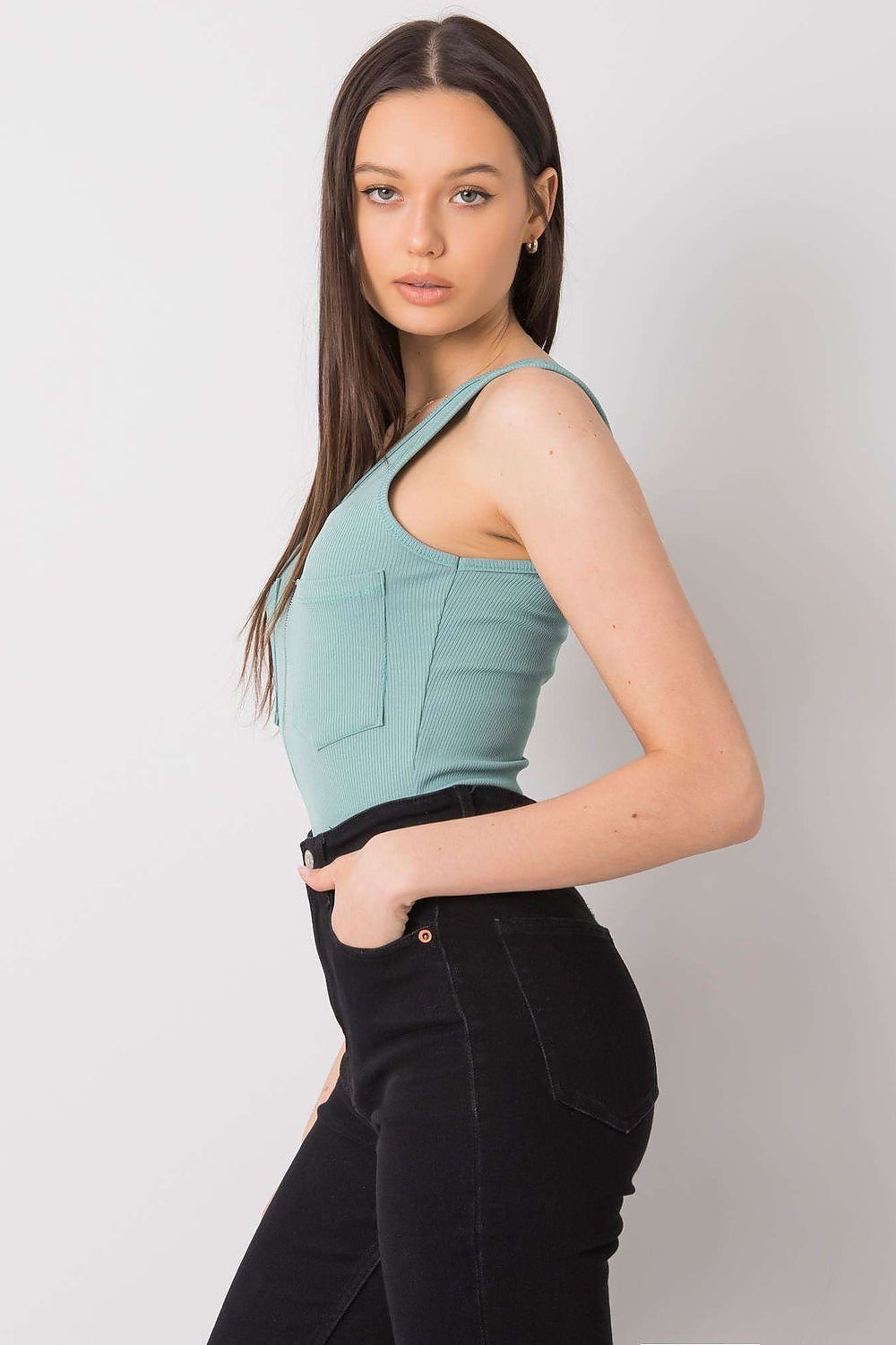 Luxury Italy Moda T-Shirt with Decorative Zipped Pockets and Round Neckline for Summer, model side profile showcasing a fashionable turquoise sleeveless top with decorative pockets, paired with sleek black trousers.