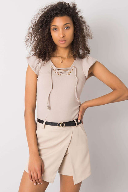 Luxurious Ribbed Frill Blouse with Decorative Cheese Neckline by Italy Moda, displayed on a model wearing the beige version with decorative lacing and stylish frill sleeves.