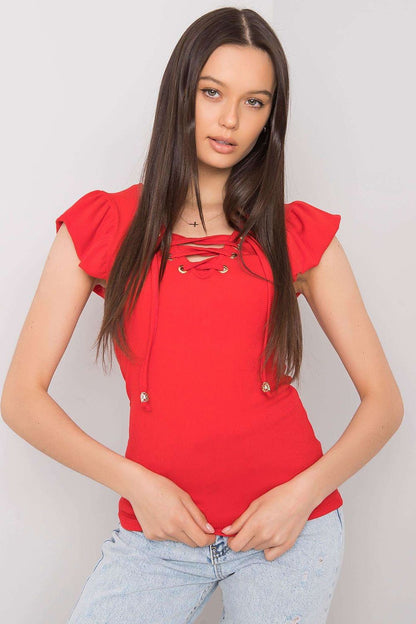 Luxurious Ribbed Frill Blouse with Decorative Cheese Neckline by Italy Moda, showcased on a model featuring a vibrant red hue and delicate frill sleeves, paired with blue jeans.