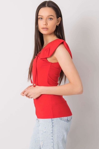 Side profile of the Luxurious Ribbed Frill Blouse with Decorative Cheese Neckline by Italy Moda in red, highlighting its unique frill and lace-up design.