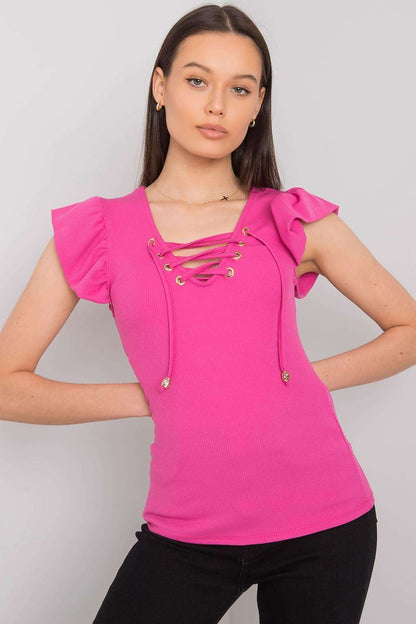 Luxurious Ribbed Frill Blouse with Decorative Cheese Neckline by Italy Moda, featuring a vibrant pink colour, short frilled sleeves, and intricate lace-up detailing adorning the neckline.