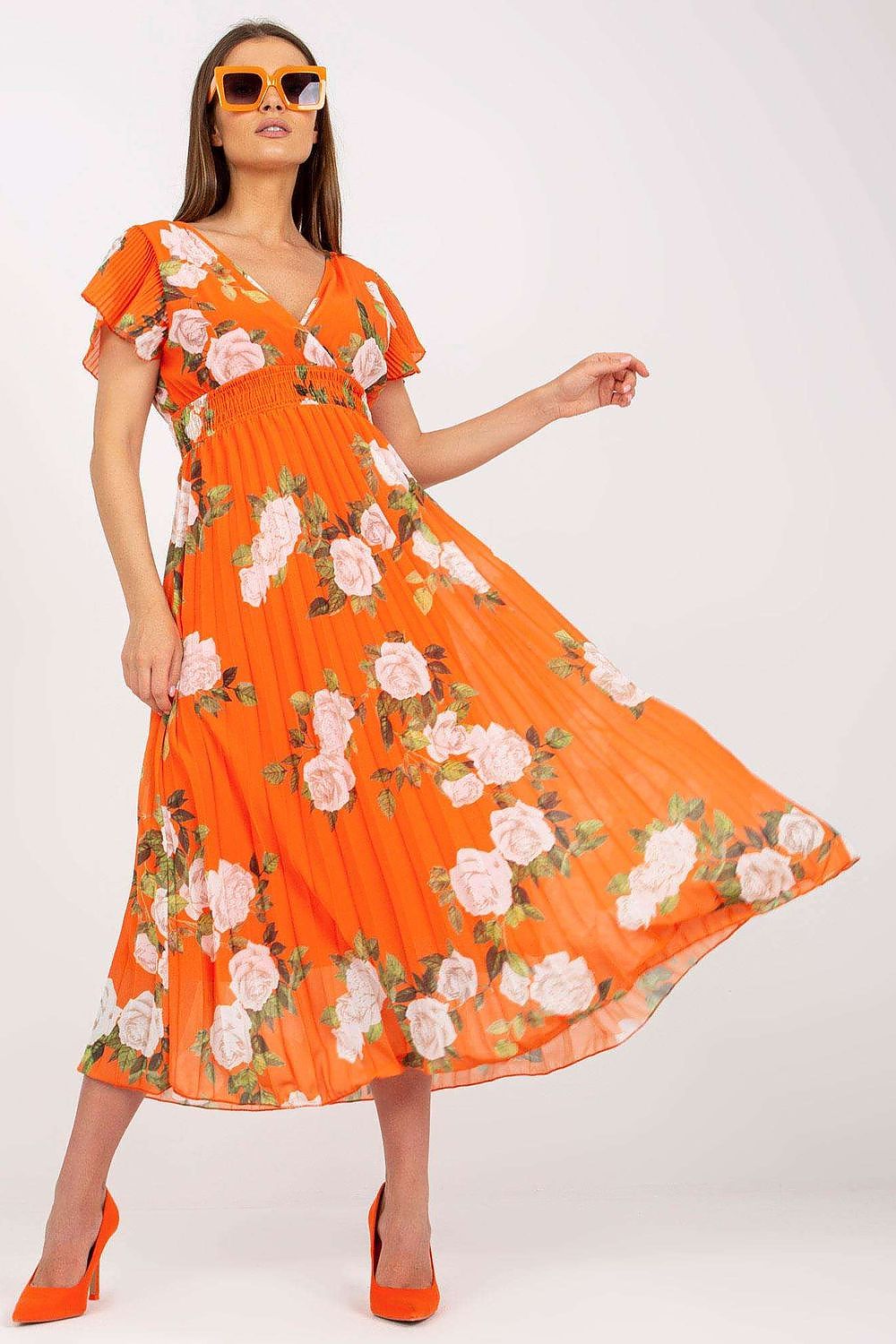Elegant Summer Dress with Frill Sleeves, Envelope Neckline & Pleated Hem by Italy Moda, showcasing a woman in a vibrant orange floral dress with delicate frill sleeves and a flowing pleated skirt.