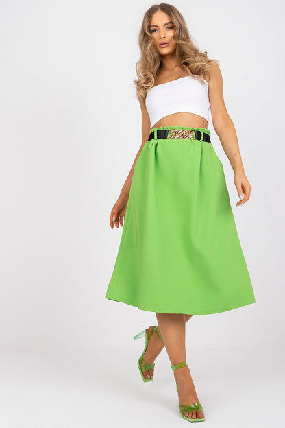 Elegant Italy Moda Skirt with Elastic Waistband, Side Pockets & Decorative Belt displayed on a model wearing a stylish white crop top and chic green heeled sandals, showcasing the vibrant colour and design of the skirt.