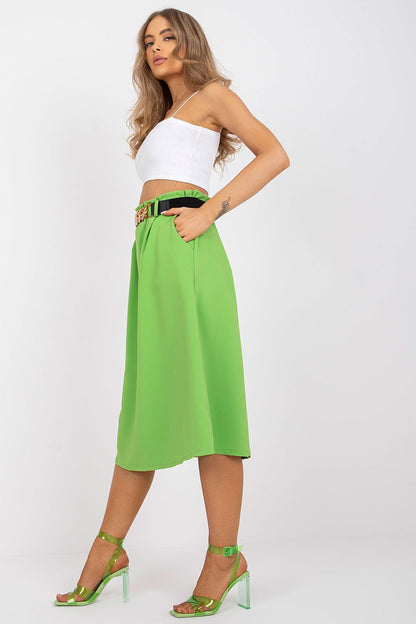 Elegant Italy Moda Skirt with Elastic Waistband, Side Pockets & Decorative Belt captured in a side view on a model, accentuating the skirt's flow and tailored look against a minimalist backdrop.