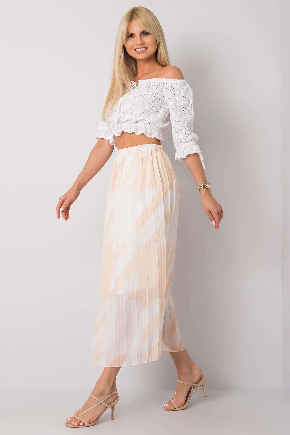 Italy Moda pleated skirt with elastic waistband displayed from a side angle, highlighting its fashion-forward design for luxurious summer styling in size EU 0.